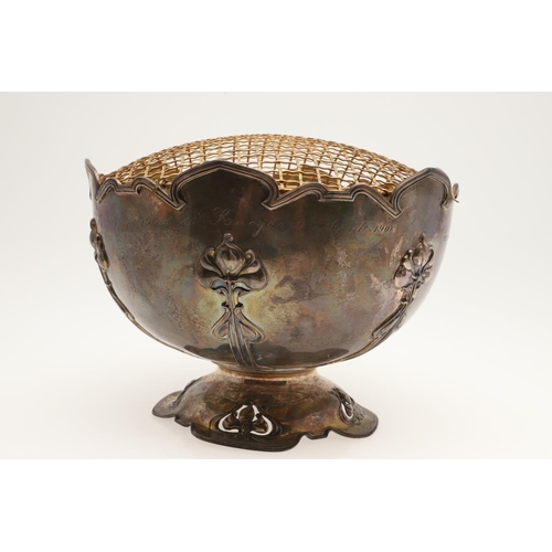 156 - AN EDWARDIAN SILVER ART-NOUVEAU ROSE BOWL. of shaped circular outline, with a moulded border, applie... 