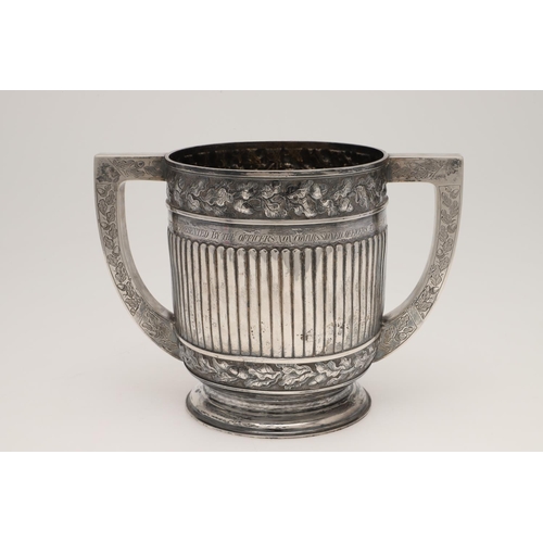 159 - A VICTORIAN TWO-HANDLED SILVER CUP. circular form with straight sides, the body with embossed flutin... 