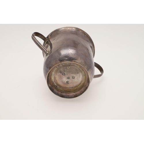 161 - A GEORGE III SILVER TWO-HANDLED CUP OR PORRINGER. of campana form, with reeded twin loop handles and... 