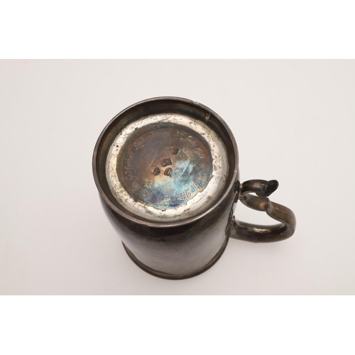 162 - A GEORGE II SILVER PINT MUG. of baluster form, with an 'S'-scroll handle and raised on a circular fo... 