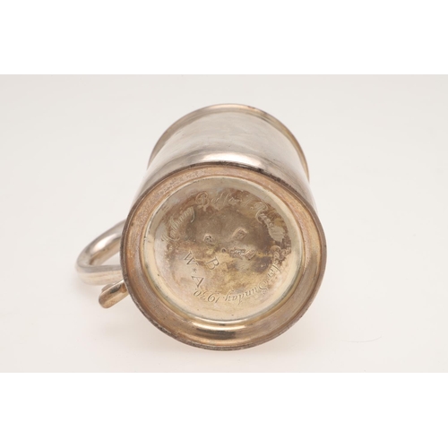 168 - A GEORGE I SILVER MUG. of baluster form, with an 'S'-scroll handle and inscribed on the base 