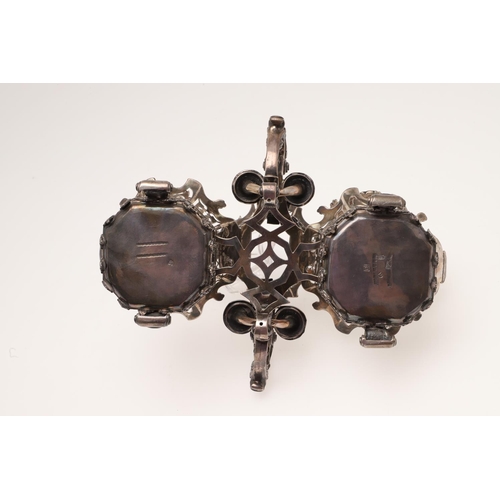 171 - AN 18TH CENTURY TWO-BOTTLE SILVER STAND. with three shaped circular sections moulded scroll & shell ... 