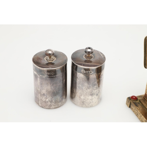 182 - A PAIR OF VICTORIAN SILVER CANNISTERS. one for use as a candle holder and the other a go-to-bed, of ... 