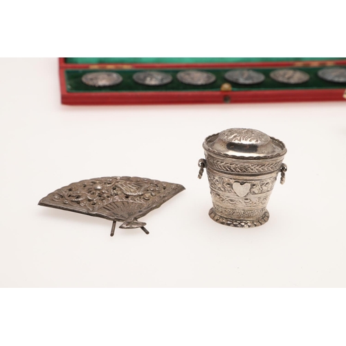 213 - A CASED SET OF SIX SILVER BUTTONS. circular form, each with a salmon in a textured ground, makers ma... 