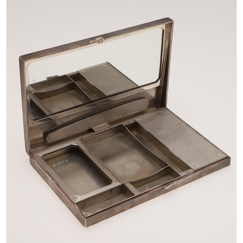 222 - A 20TH CENTURY SILVER DRESSING TABLE BOX. of rectangular outline, the body with engine-turned decora... 