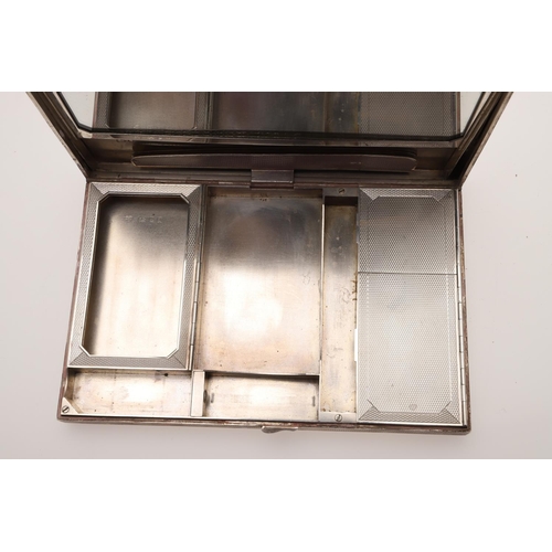 222 - A 20TH CENTURY SILVER DRESSING TABLE BOX. of rectangular outline, the body with engine-turned decora... 