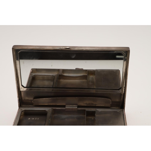 222 - A 20TH CENTURY SILVER DRESSING TABLE BOX. of rectangular outline, the body with engine-turned decora... 