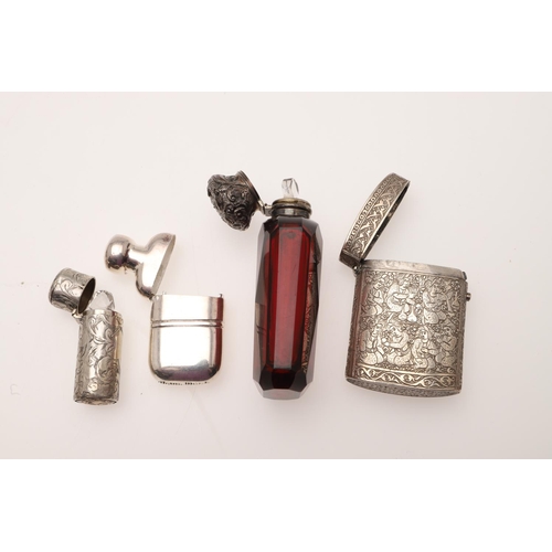 228 - A MIXED LOT. to include 3 silver mounted scent bottles, a cased cheroot holder, a Far-Eastern silver... 