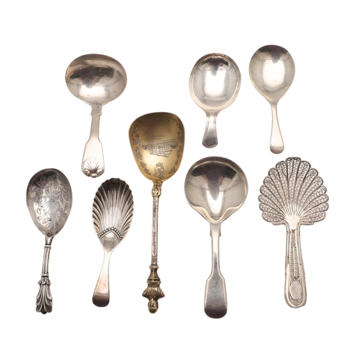 37 - SEVEN SILVER CADDY SPOONS. including a filigree example, unmarked, a George III caddy spoon, no make... 