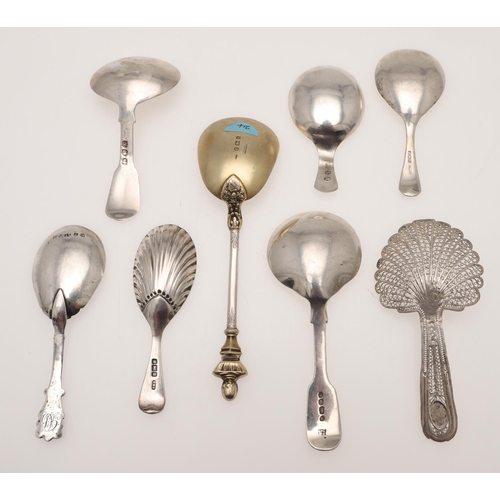 37 - SEVEN SILVER CADDY SPOONS. including a filigree example, unmarked, a George III caddy spoon, no make... 