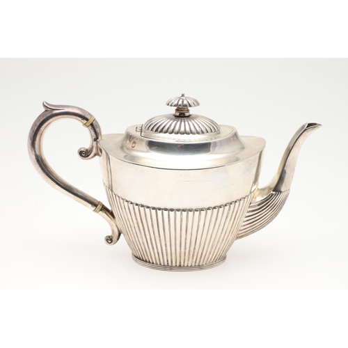 47 - A LATE VICTORIAN FOUR-PIECE SILVER TEA & COFFEE SERVICE. of oval form, with scroll handles and the b... 