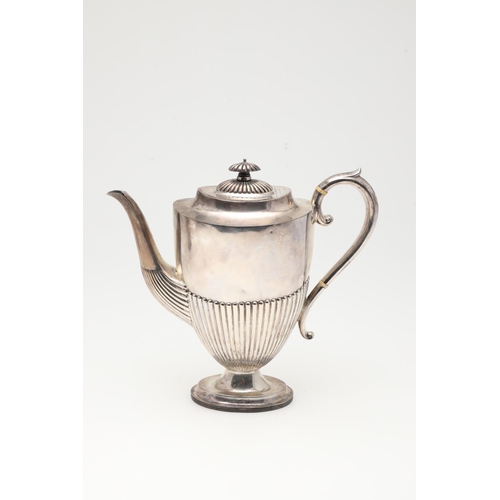 47 - A LATE VICTORIAN FOUR-PIECE SILVER TEA & COFFEE SERVICE. of oval form, with scroll handles and the b... 