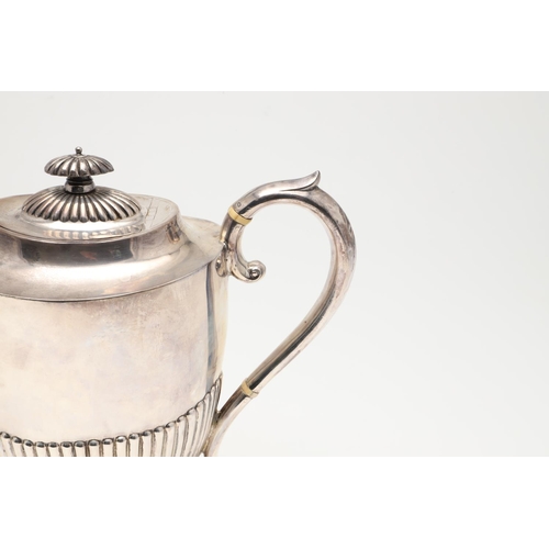 47 - A LATE VICTORIAN FOUR-PIECE SILVER TEA & COFFEE SERVICE. of oval form, with scroll handles and the b... 