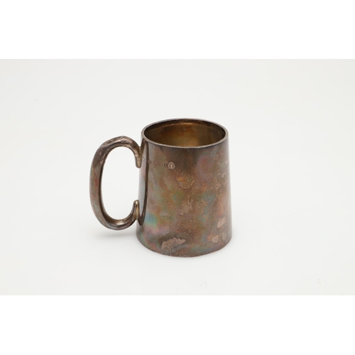 48 - A GEORGE II SILVER BALUSTER MUG. with an 'S'-scroll handle and a spreading circular foot, gilt inter... 