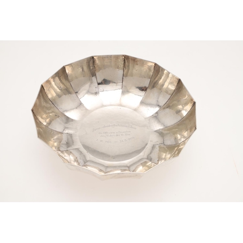 59 - A 20TH CENTURY GERMAN SILVER FRUIT DISH. shaped circular outline, with a slightly hammered finish, a... 