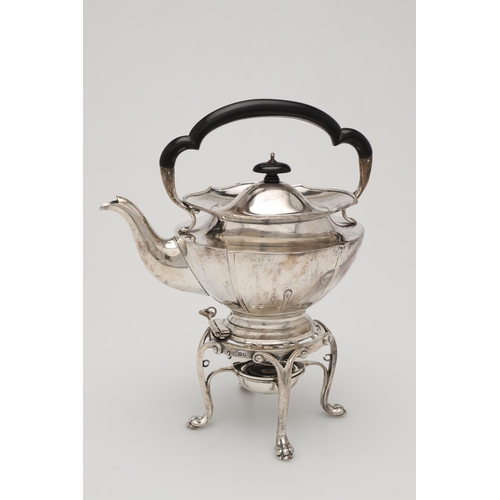 72 - AN EDWARDIAN SILVER KETTLE ON STAND. shaped oval form, with a wavy rim and ribbed decoration, initia... 