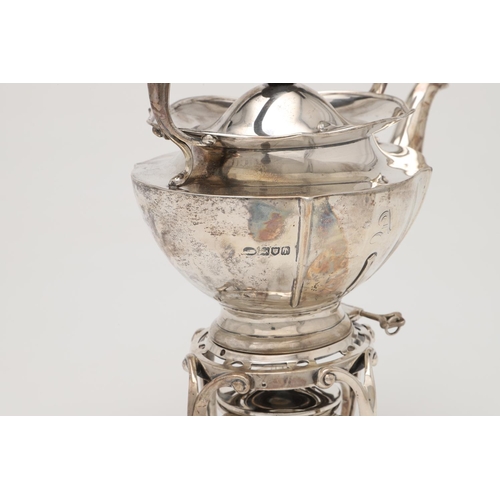 72 - AN EDWARDIAN SILVER KETTLE ON STAND. shaped oval form, with a wavy rim and ribbed decoration, initia... 