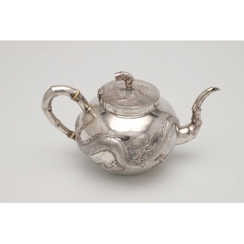 84 - A LATE 19TH/ EARLY 20TH CENTURY THREE-PIECE CHINESE SILVER TEA/ COFFEE SET. circular form, with natu... 