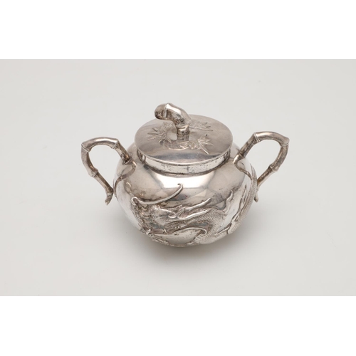 84 - A LATE 19TH/ EARLY 20TH CENTURY THREE-PIECE CHINESE SILVER TEA/ COFFEE SET. circular form, with natu... 