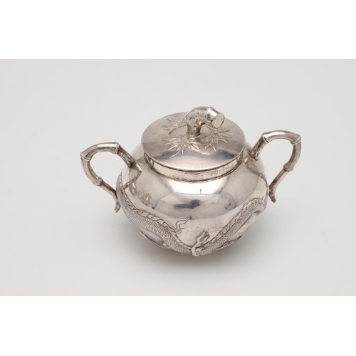 84 - A LATE 19TH/ EARLY 20TH CENTURY THREE-PIECE CHINESE SILVER TEA/ COFFEE SET. circular form, with natu... 