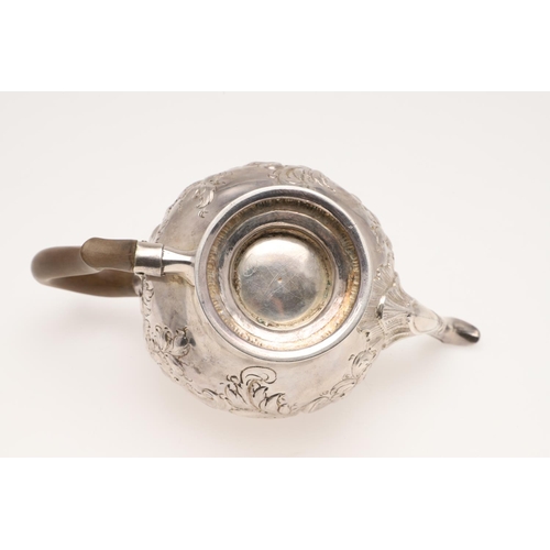 86 - A GEORGE III SILVER TEA POT. inverted baluster form, with a figural finial, scroll handle and later ... 