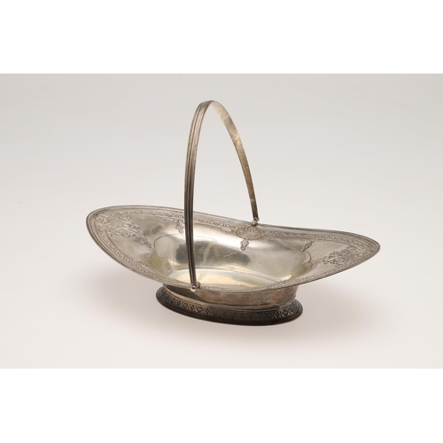 89 - A VICTORIAN SILVER SWING-HANDLED BASKET. of navette outline, with reeded borders, chased foliate scr... 