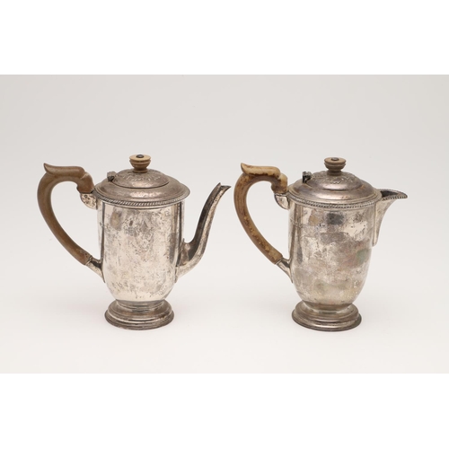 92 - A VERY NEAR PAIR OF 20TH CENTURY SILVER CAFE AU LAIT POTS. circular form, with gadrooned borders, ap... 