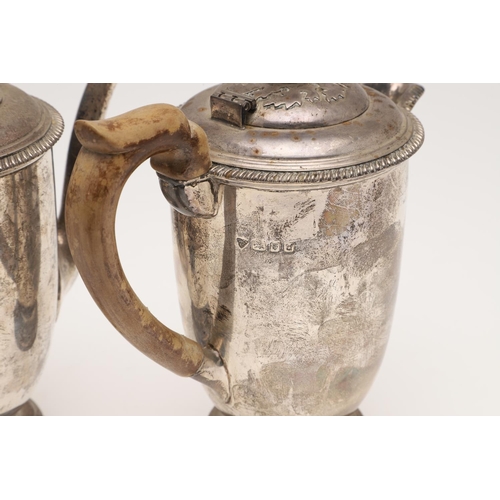 92 - A VERY NEAR PAIR OF 20TH CENTURY SILVER CAFE AU LAIT POTS. circular form, with gadrooned borders, ap... 