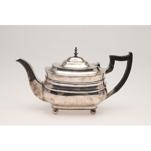 94 - A GEORGE V SILVER TEA POT & MATCHING SUGAR BASIN. rounded rectangular form, with angular handles and... 