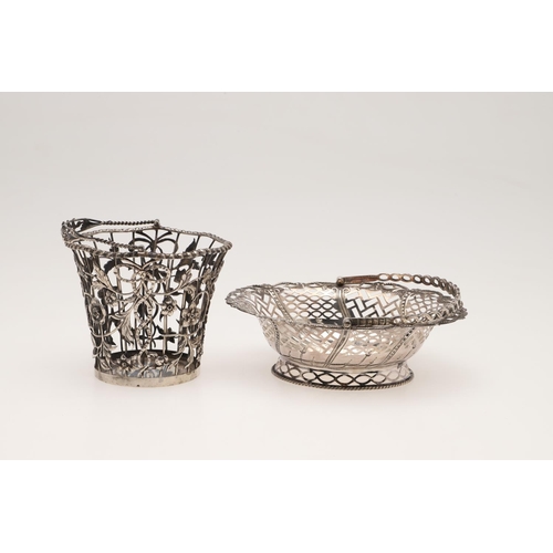 96 - A GEORGE III SILVER SWING-HANDLED SWEETMEAT BASKET. shaped oval outline, with pierced sides, embosse... 