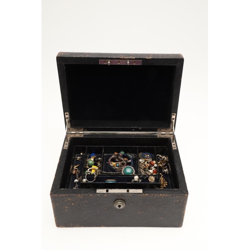 459 - A QUANTITY OF JEWELLERY IN A BLACK LEATHER JEWELLERY BOX. including a garnet and gold cluster ring, ... 