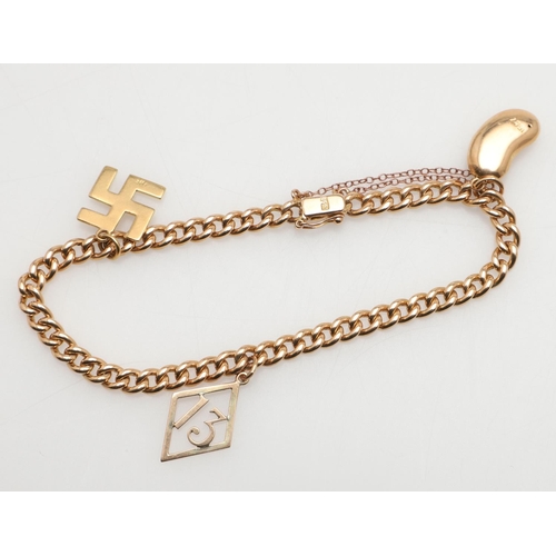 475 - A 15CT GOLD CURB LINK BRACELET. suspending three gold charms, 18.5cm long, 17.7 grams.