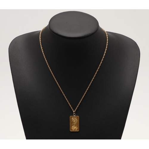 483 - A 10G 99.9% GOLD INGOT ON 9 CARAT GOLD CHAIN. the rectangular ingot with female bust on obverse and ... 