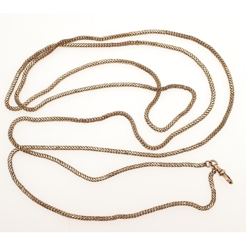 506 - A 9CT GOLD HERRINGBONE LINK LONG GUARD CHAIN. 145cm long, 42 grams.