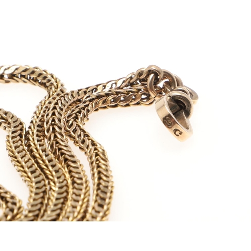 506 - A 9CT GOLD HERRINGBONE LINK LONG GUARD CHAIN. 145cm long, 42 grams.