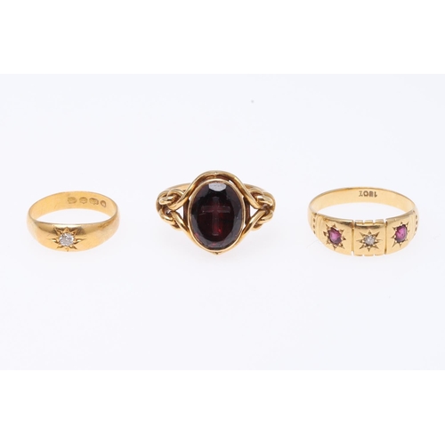 510 - A GARNET AND GOLD MOURNING RING. set with an oval-shaped garnet engraved with a cross, inscription t... 