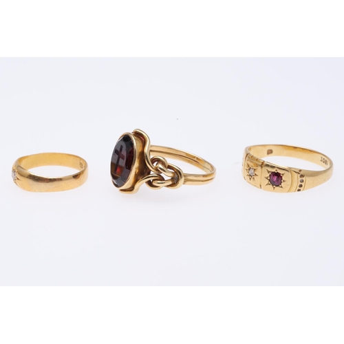 510 - A GARNET AND GOLD MOURNING RING. set with an oval-shaped garnet engraved with a cross, inscription t... 