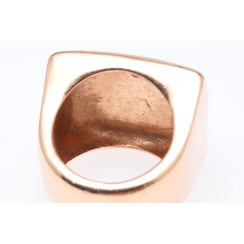 511 - A LARGE GOLD RING. of rectangular-shape, 26 grams. Size L.