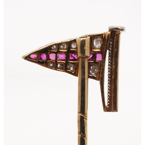 541 - A RUBY AND DIAMOND FLAG STICK PIN FOR THE ROYAL YACHT SQUADRON. mounted with calibre-cut rubies and ... 