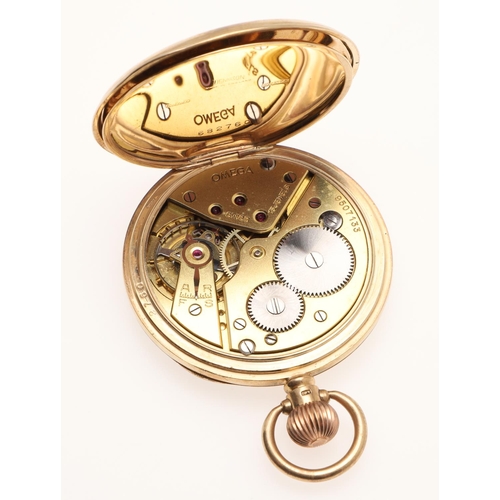 565 - A 9CT GOLD OPEN FACED POCKET WATCH BY OMEGA. the signed white enamel dial with Arabic numerals and s... 