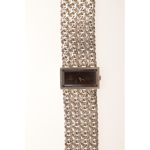 571 - A LADY'S VINTAGE MECHANICAL SILVER BRACELET WRISTWATCH BY OMEGA DE VILLE. the signed rectangular-sha... 