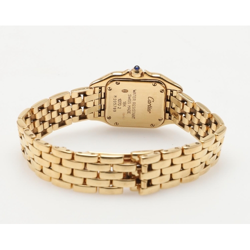 585 - A LADY'S 18CT GOLD PANTHERE WRISTWATCH BY CARTIER. the signed square-shaped dial with Roman numerals... 