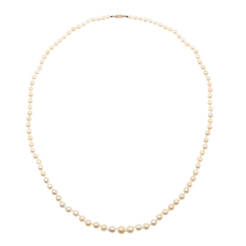 851 - A SINGLE ROW GRADUATED NATURAL PEARL NECKLACE. the ninety five pearls graduate to a gold lozenge-sha... 