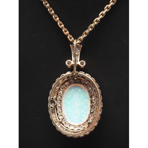 852 - AN OPAL AND DIAMOND BROOCH PENDANT. the oval-shaped solid white opal is set within a double surround... 