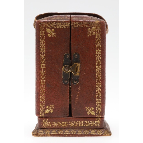 858 - A FRENCH MINIATURE GILT METAL TRAVELLING TIMEPIECE. late 19th/early 20th century, the case with carr... 