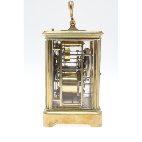 859 - AN EARLY 20TH CENTURY BRASS REPEATER ALARM CARRIAGE CLOCK. late 19th century, the enamel dial signed... 