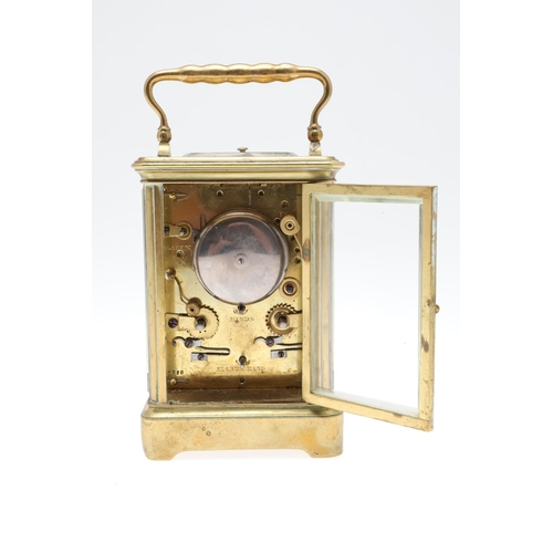 859 - AN EARLY 20TH CENTURY BRASS REPEATER ALARM CARRIAGE CLOCK. late 19th century, the enamel dial signed... 