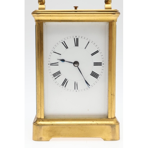 860 - A LATE 19TH CENTURY FRENCH BRASS REPEATER CARRIAGE CLOCK. by Henri Jacot,having a white enamel Roman... 