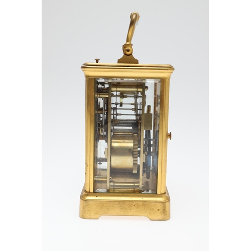 860 - A LATE 19TH CENTURY FRENCH BRASS REPEATER CARRIAGE CLOCK. by Henri Jacot,having a white enamel Roman... 