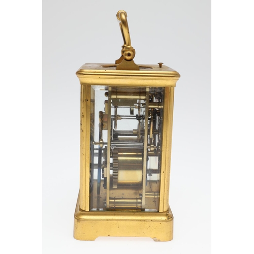 860 - A LATE 19TH CENTURY FRENCH BRASS REPEATER CARRIAGE CLOCK. by Henri Jacot,having a white enamel Roman... 
